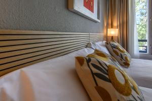 Postel nebo postele na pokoji v ubytování Hotel Don Diego by Ĥ