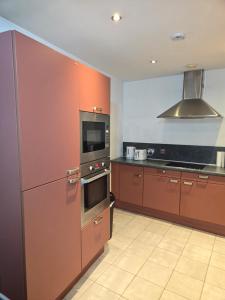 Kuchyň nebo kuchyňský kout v ubytování Cosy 2 bedroom apartment