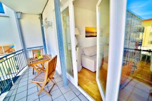 Ein Balkon oder eine Terrasse in der Unterkunft Ferienwohnung Binzer Strandgut im Haus Jahreszeiten Binz