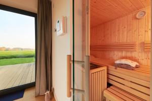 Postel nebo postele na pokoji v ubytování Ferienhaus Backsteinquartier C Putbus