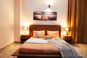 Postel nebo postele na pokoji v ubytování SERENITY SUITE Grand T2 Neuf Riviera Bonoumin