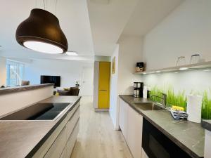 Køkken eller tekøkken på Ferienwohnung Leuchtfeuer im Haus Zudar Prora