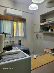 Kuchyň nebo kuchyňský kout v ubytování Martintar One bdrm Lodge 3