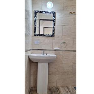 Koupelna v ubytování Departamentos Manantiales + 1 fotografie