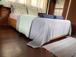 Postel nebo postele na pokoji v ubytování CASA Ecológica Paraty