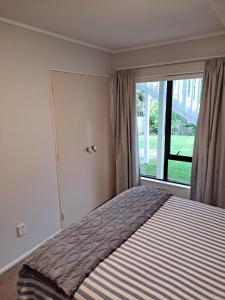 Ένα ή περισσότερα κρεβάτια σε δωμάτιο στο Relax in Red Beach! +9 φωτογραφίες