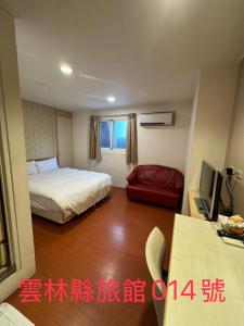 A bed or beds in a room at KD hotel