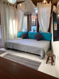 Postel nebo postele na pokoji v ubytování CASA Ecológica Paraty