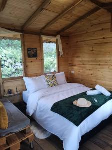 Postel nebo postele na pokoji v ubytování Glamping Entre Nopales, Villa de Leyva