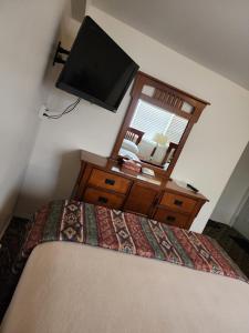 TV a/nebo společenská místnost v ubytování hi way motel