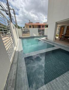 Bazén v ubytování Flat Privê Paraíso dos Carneiros Praia dos Carneiros nebo v jeho okolí