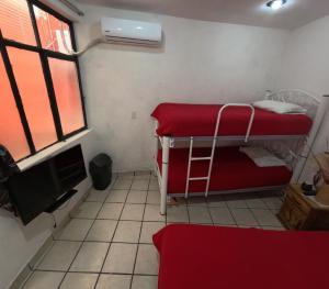 Ένα ή περισσότερα κρεβάτια σε δωμάτιο στο CABALLERO habitación#3