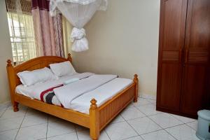 Postel nebo postele na pokoji v ubytování Muju Hotel
