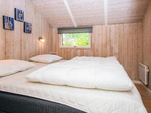 Postel nebo postele na pokoji v ubytování Holiday home Ansager XLI