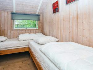 Postel nebo postele na pokoji v ubytování Holiday home Ansager XLI