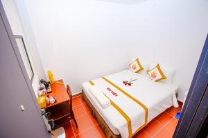 Postel nebo postele na pokoji v ubytování The Rice Sen Ốc 191 - 226 Bùi Viện