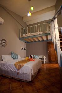 Postel nebo postele na pokoji v ubytování Cloudenjoy B&B