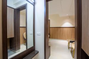 Koupelna v ubytování Hotel PRM Aruna Archadia + 37 fotografií