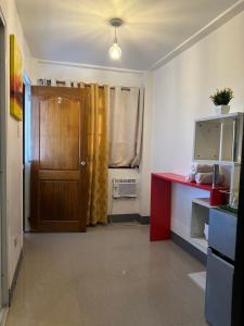 Eldhús eða eldhúskrókur á Tacloban EVMC Gdex Transient House