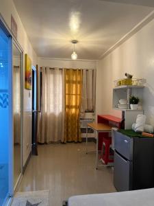 Eldhús eða eldhúskrókur á Tacloban EVMC Gdex Transient House