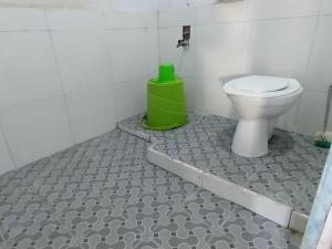 Ένα μπάνιο στο Homestay larangga