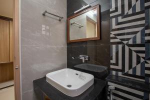 Koupelna v ubytování Hotel PRM Aruna Archadia