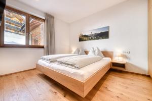 Postel nebo postele na pokoji v ubytování Damüls Appartements