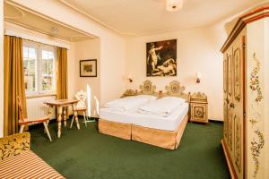 Postel nebo postele na pokoji v ubytování Hotel Traube