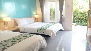 Letto o letti in una camera di SeTu Divespot & Resort