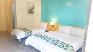 Letto o letti in una camera di SeTu Divespot & Resort