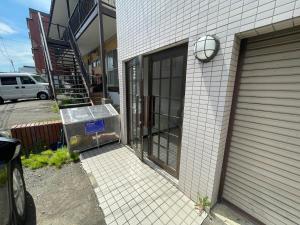 Minami-jūichijōにあるレジデンス平岸の門入口