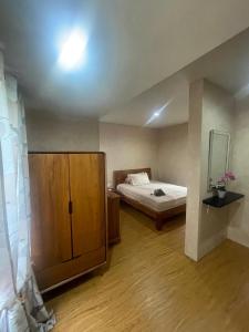 En eller flere senge i et værelse på Elia Bali heaven villa + 13 billeder