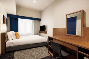 Letto o letti in una camera di Four Points Flex by Sheraton Osaka Umeda