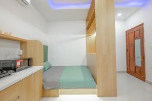 Kuchyň nebo kuchyňský kout v ubytování Q Hotel & Apartment Da Nang