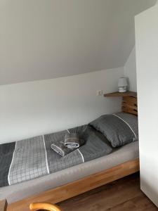 Кровать или кровати в номере Gästehaus Pürgg