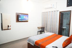 TV a/nebo společenská místnost v ubytování Kashi Paradise Stay by visitkashi
