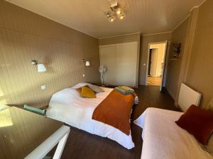 Postel nebo postele na pokoji v ubytování Chalet avec Spa Magnifique vue