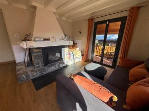 Posezení v ubytování Chalet avec Spa Magnifique vue