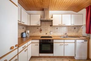 Kuchyň nebo kuchyňský kout v ubytování Haus Schöneck