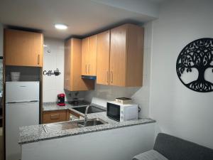 Køkken eller tekøkken på Home Sweet beach 2 dormitorios