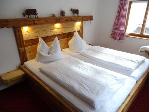 Ein Bett oder Betten in einem Zimmer der Unterkunft Haus Mitterstang