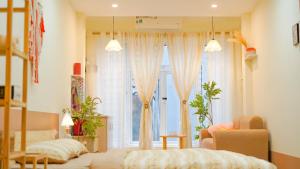 Ένα ή περισσότερα κρεβάτια σε δωμάτιο στο Lee AH HomeStay