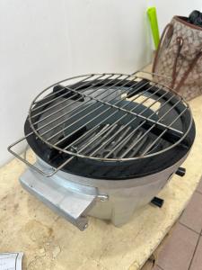 a grill sitting on top of a table at Canyon Cove by Lawton in Nasugbu