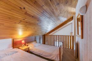 Postel nebo postele na pokoji v ubytování Souveraine 3 Charmant Appartement