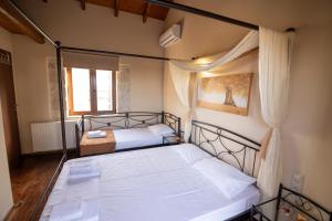 Ένα ή περισσότερα κρεβάτια σε δωμάτιο στο Villa Thalasena +44 φωτογραφίες