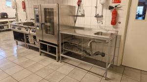 Kuchyň nebo kuchyňský kout v ubytování Hotel Dalhem + 18 fotografií