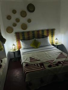 Postel nebo postele na pokoji v ubytování Riad rajad Marrakech
