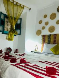 Postel nebo postele na pokoji v ubytování Riad rajad Marrakech