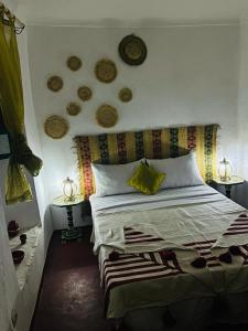 Postel nebo postele na pokoji v ubytování Riad rajad Marrakech