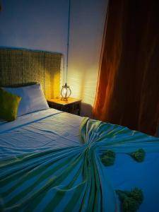 Postel nebo postele na pokoji v ubytování Riad rajad Marrakech
